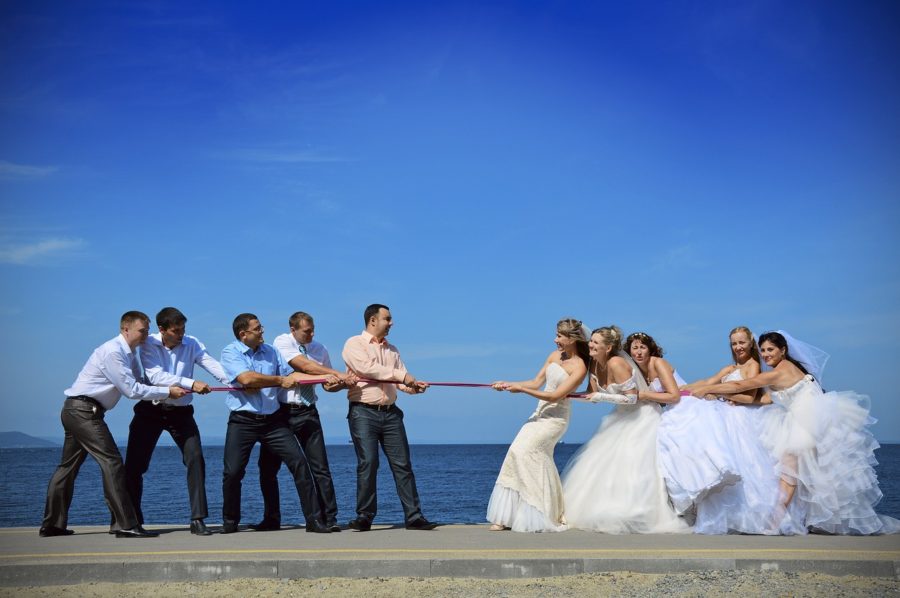 price difference - private reception or restaurant reception bride and groom tug a war